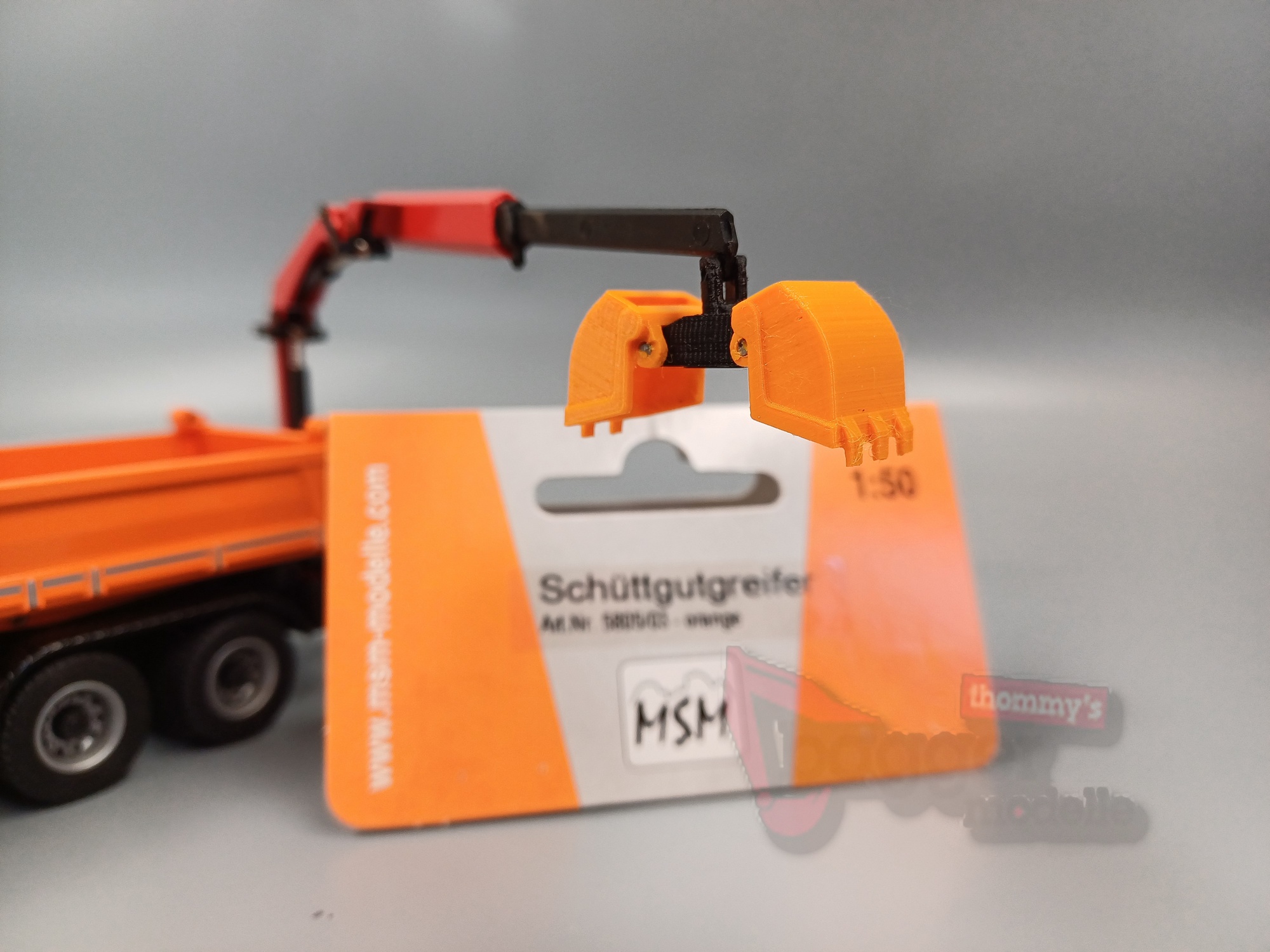 5805-3 - MSM - Schüttgutgreifer orange